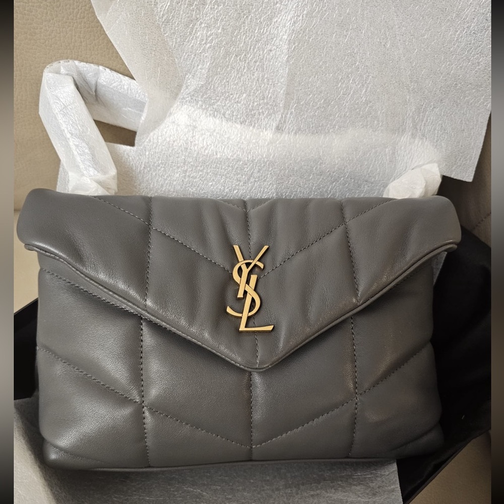 SAINT LAURENT
Loulou Puffer Toy quilted leather shoulder bag.